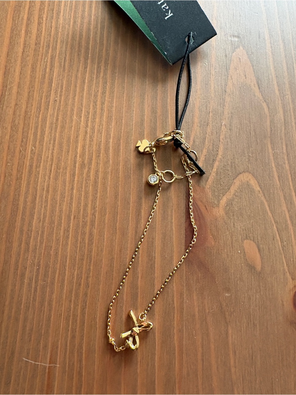Girlie Pearlie Kate Spade Gold Bow Charm Bracelet with Crystal and Bow Accent